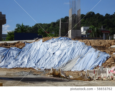 Temporary slope protection using plastic sheets Temporary slope protection using plastic sheets 56658762