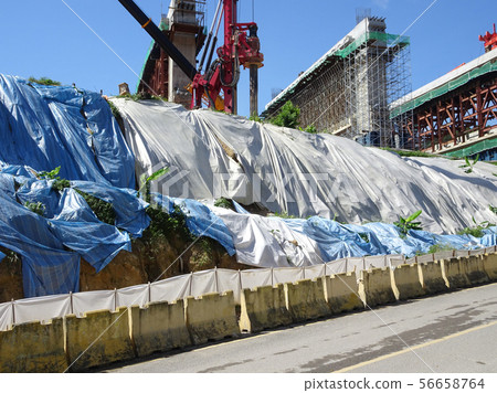 Temporary slope protection using plastic sheets Temporary slope protection using plastic sheets 56658764