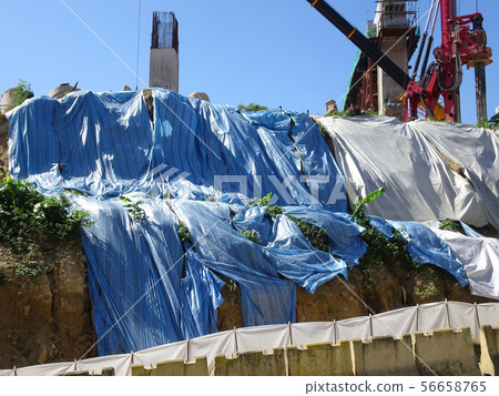 Temporary slope protection using plastic sheets Temporary slope protection using plastic sheets 56658765
