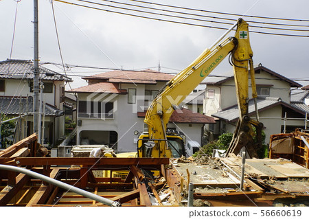 Demolition work Reconstruction Wooden house Heavy machinery Separate collection Demolition work Reconstruction Wooden house Heavy machinery Separate collection 56660619