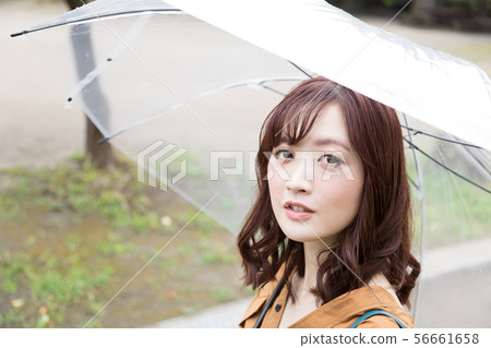 Rainy woman 56661658