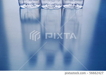 PET bottle with water expressed in reflected light 56662427