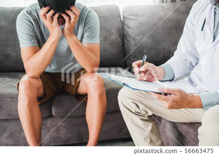 Doctor consulting and diagnostic examining with 56663475