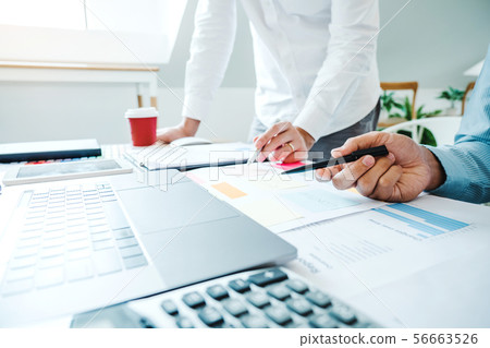 Multiracial creative team working together in 56663526