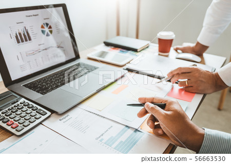 Multiracial creative team working together in Multiracial creative team working together in 56663530