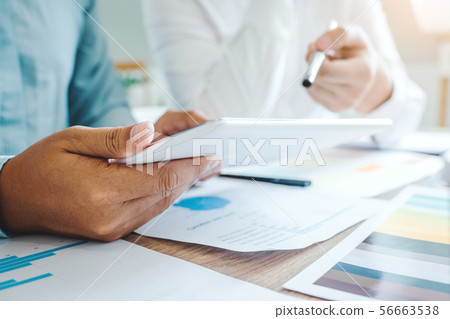 Multiracial creative team working together in Multiracial creative team working together in 56663538