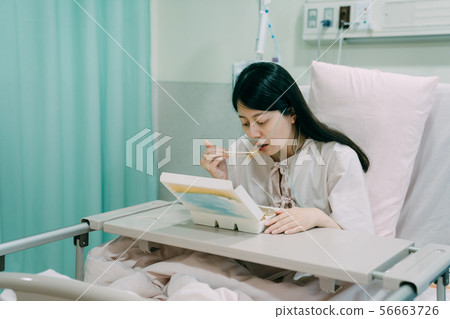 illness lady using chopsticks eating boxed lunch illness lady using chopsticks eating boxed lunch 56663726
