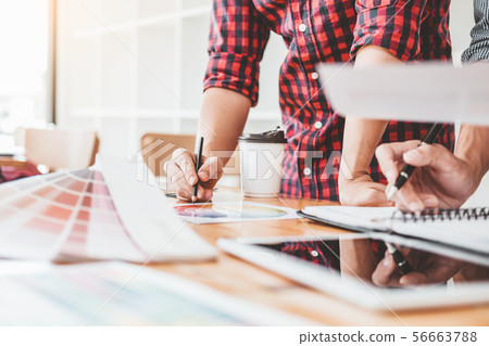 Two Graphic designer Brainstorming Meeting and Two Graphic designer Brainstorming Meeting and 56663788