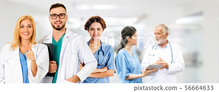 Doctor working in hospital with other doctors. Doctor working in hospital with other doctors. 56664633
