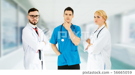 Doctor working in hospital with other doctors. Doctor working in hospital with other doctors. 56665059