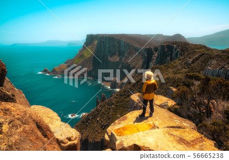 Trekking in Tasman Peninsula, Tasmania, Australia. Trekking in Tasman Peninsula, Tasmania, Australia. 56665238