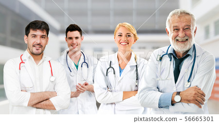 Doctor working in hospital with other doctors. 56665301