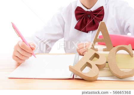 High school girls studying notes and alphabet High school girls studying notes and alphabet 56665368