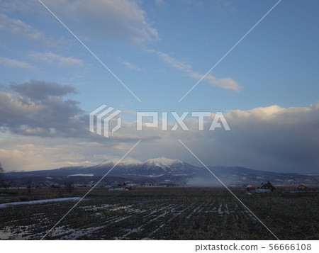 Countryside and Tokachidake mountain range Countryside and Tokachidake mountain range 56666108