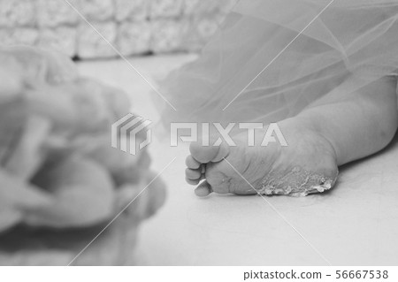 leg of baby food on white background. Feet, cake 56667538