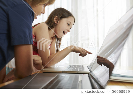 School children studying in class 56668939