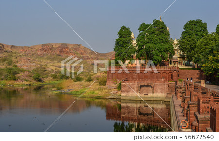 Lake scenery with ancient temple 56672540
