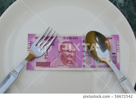 A new Indian currency note of 2000 rupees A new Indian currency note of 2000 rupees 56672542