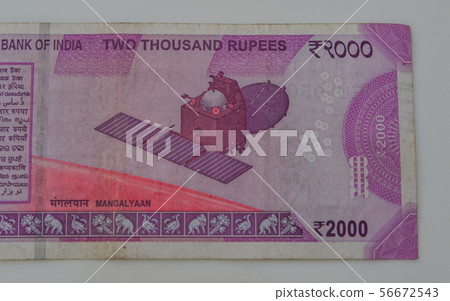 A new Indian currency note of 2000 rupees A new Indian currency note of 2000 rupees 56672543