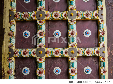 Ancient door of traditonal wooden house 56672627