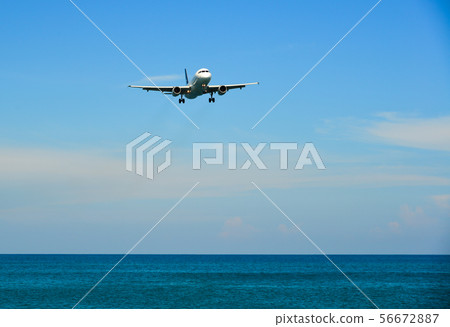 Airplane landing at Phuket Airport (Thailand) Airplane landing at Phuket Airport (Thailand) 56672887