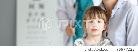 Happy smiling family at child doctor office 56677222