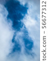 The starry sky through the clouds 56677312