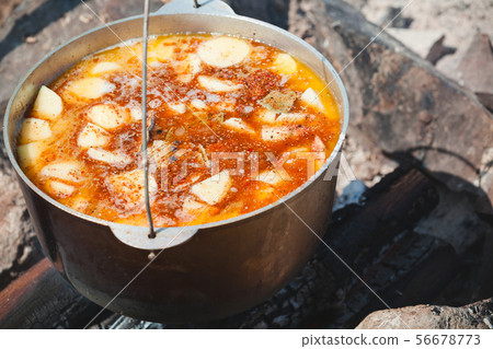 Spicy soup in a cauldron Spicy soup in a cauldron 56678773