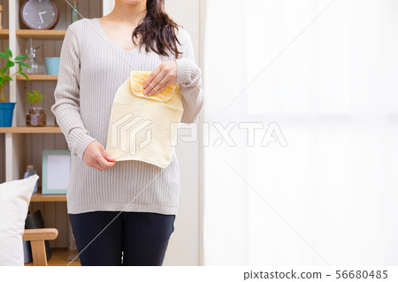 Woman with sweat pad 56680485