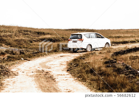 Car is driving on a country up hill mountain 56682612