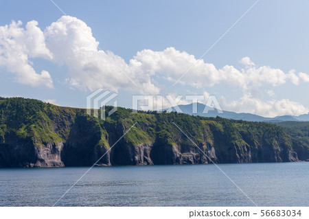 Shiretoko peninsula in summer seen from a pleasure boat (Hokkaido) Shiretoko peninsula in summer seen from a pleasure boat (Hokkaido) 56683034