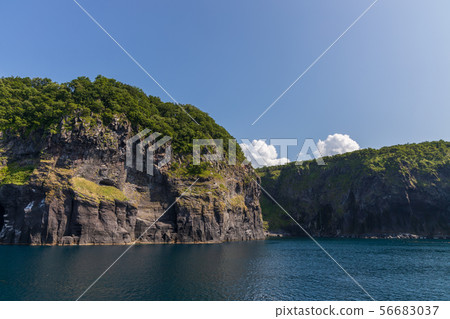 Shiretoko peninsula in summer seen from a pleasure boat (Hokkaido) Shiretoko peninsula in summer seen from a pleasure boat (Hokkaido) 56683037