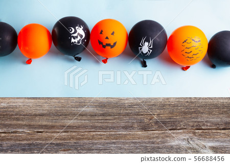 Halloween scene with balloons 56688456