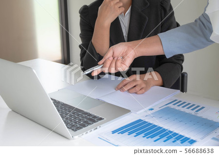Two business women have analyzed the chart Two business women have analyzed the chart 56688638