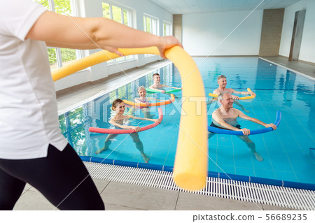 People in aqua fitness class during a physical therapy session 56689235