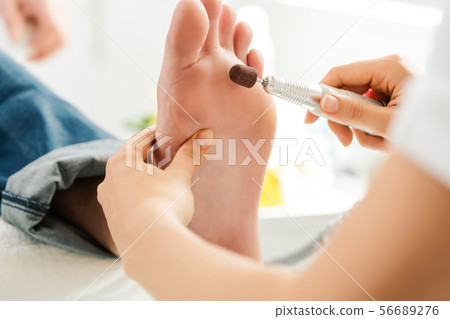 Man during medical podiatry session 56689276