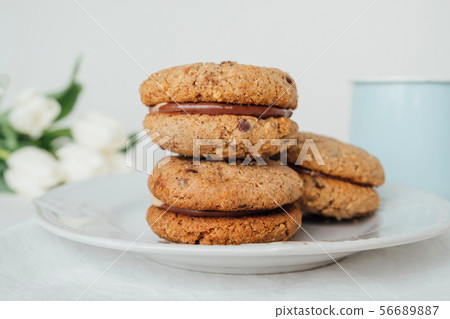 cookies Baci di Dama or Lady kisses with chocolate cookies Baci di Dama or Lady kisses with chocolate 56689887