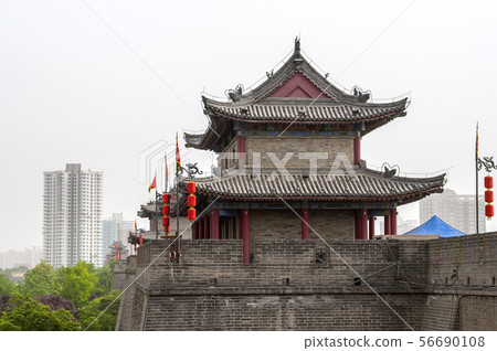 Xi'an, fortification wall with a watchtower. Xi'an, fortification wall with a watchtower. 56690108