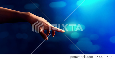 Hand pressing a button 56690628