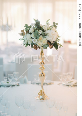 Wedding bouquet on the table in restaurant Wedding bouquet on the table in restaurant 56691024