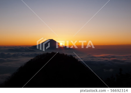 Mt. Fuji and sunrise from Mt. Kasumigatake in the Southern Alps Mt. Fuji and sunrise from Mt. Kasumigatake in the Southern Alps 56692314