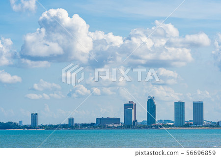 Beautiful landscape of sea with Pattaya cityscape and white cloud on blue sky 56696859