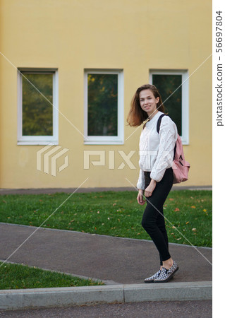 Student girl with backpack Student girl with backpack 56697804