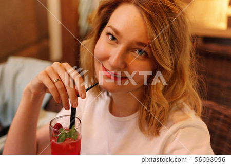 Girl in a cafe Girl in a cafe 56698096