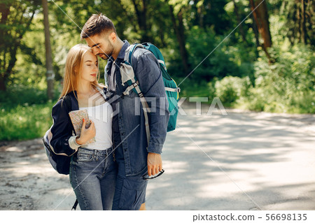 Cute couple have a rest in a summer forest 56698135