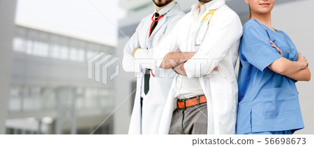 Doctor working in hospital with other doctors. Doctor working in hospital with other doctors. 56698673