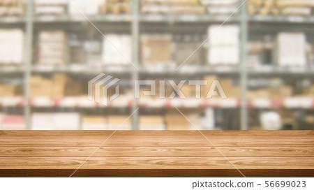 Wood table in warehouse storage blur background. Wood table in warehouse storage blur background. 56699023