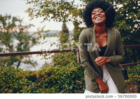 African girl in a summer city 56700000