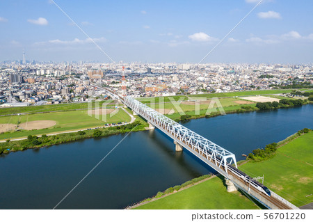 Overlooking the skyliner across the Edogawa to Chiba Prefecture Overlooking the skyliner across the Edogawa to Chiba Prefecture 56701220
