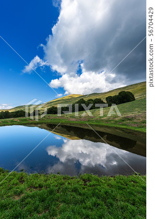 Lake with reflections - Monte Baldo Alps Italy Lake with reflections - Monte Baldo Alps Italy 56704429